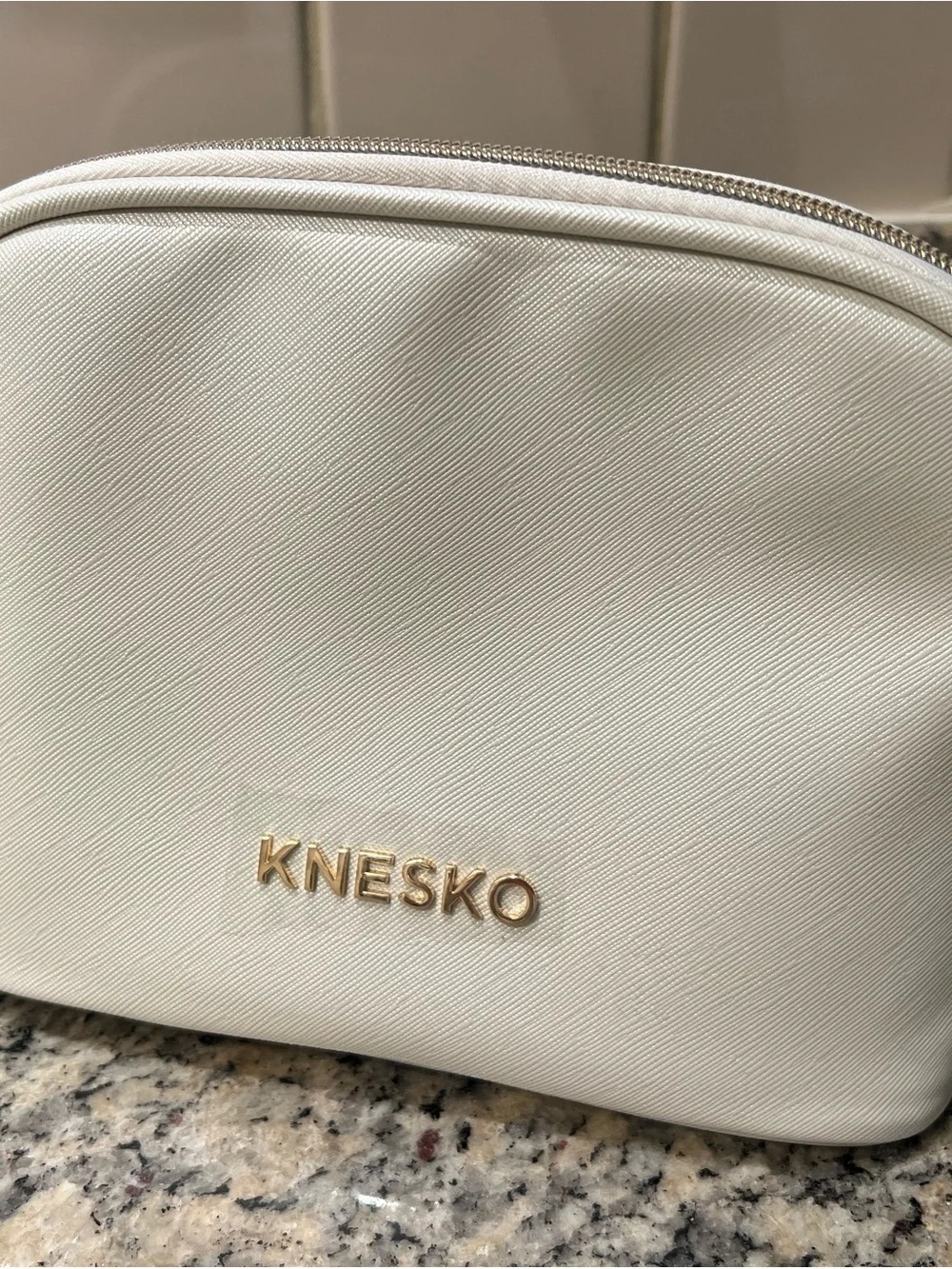 Cream Knesko cosmetic bag. Never used.